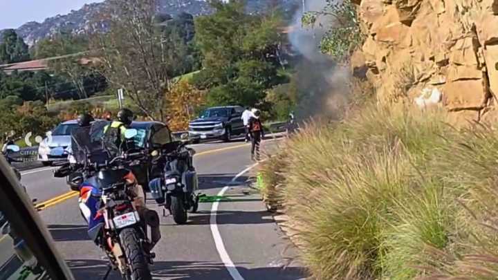 Rider hospitalized after motorcycle crash ignites San Fernando Valley brush fire