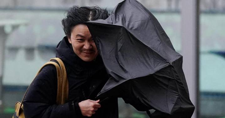 Amber weather warning in force as heavy rain raises flood risk