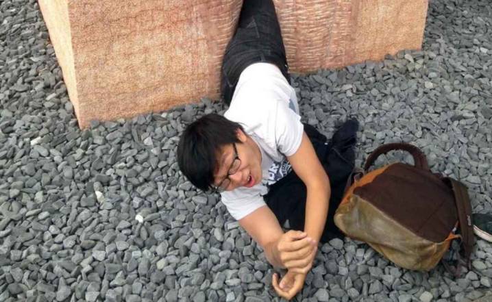 Man trapped in vagina sculpture