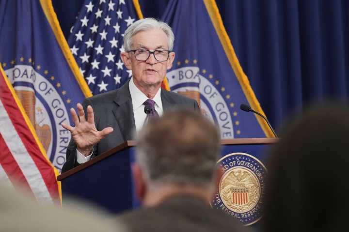 Federal Reserve cuts key rate but signals higher bar for future reductions