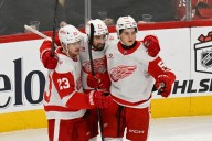 DeBrincat scores twice as Red Wings shut out Blackhawks