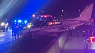 Small plane with two onboard lands along Interstate 95 in Cocoa