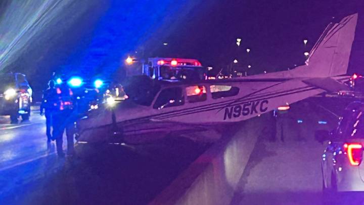 Small plane with two onboard lands along Interstate 95 in Cocoa