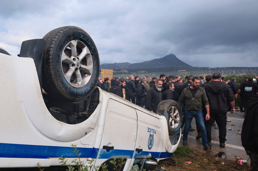 Protesting Greek farmers swarm onto aircraft parking area of an international airport on Crete