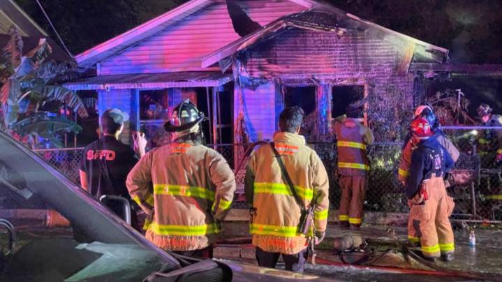Dog killed, residents displaced after fire spreads between 2 west
