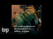 U.S. Marine thrown to the ground by U.S. military in Japan