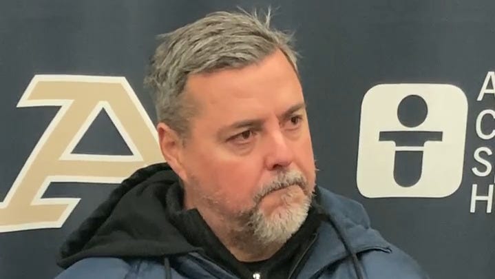 Akron coach Jared Embick reacts to tournament loss to St. Louis
