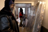 Raided South Shore building's tenants move out