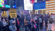 Times Square protesters march in support of Mahmoud Khalil