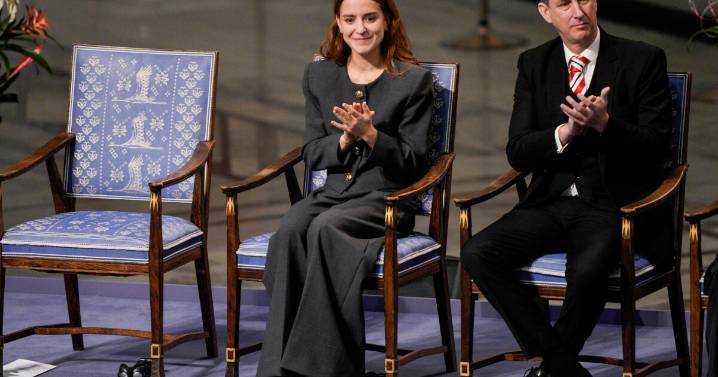 Venezuelan Nobel winner stays hidden while daughter accepts award in Oslo