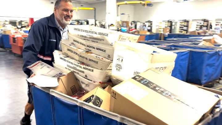 'All hands on deck': USPS braces for busiest week of the year as holiday mail surges