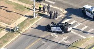 Dallas police officers hospitalized after vehicle involved in crash, flipped on roof