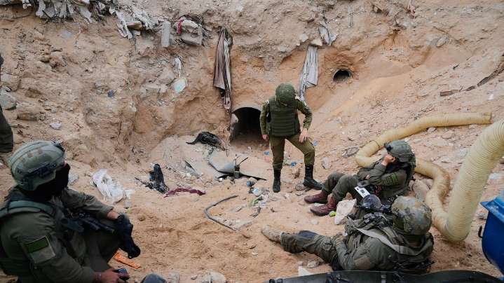 Israeli army takes journalists into a tunnel in a Gaza city it seized and largely flattened