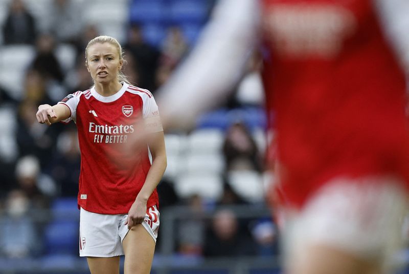 Soccer-Williamson's first game since Euro final a highlight of Arsenal win