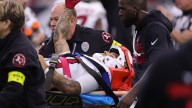 NFL star carted off with neck injury as emotional teammates look on in concern