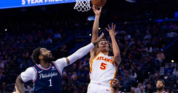 Johnson hits late 3s for Hawks to spoil Embiid's 76ers return in 142