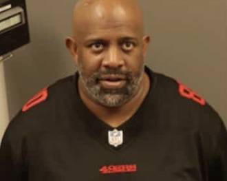 Former Morningside High School football coach arrested on grand theft charges
