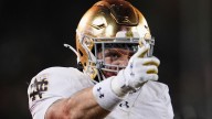 Love gets hurt but returns as No. 9 Notre Dame routs Stanford 49