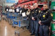 Police and fire organizations team up to shop for local families in need