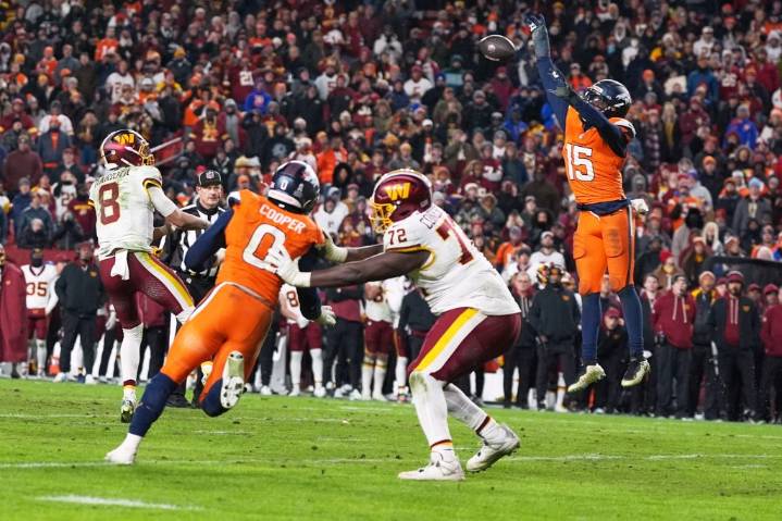 Broncos escape with overtime win over Commanders as streaks continue