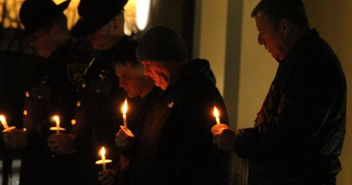 Candlelight vigil draws hundreds in prayer for wounded National Guardsman