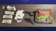 Dayton PD seizes $25K, guns and suspected drugs in warrant raid for alleged dealer