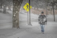 Heavy snow, howling winds snarl travel across Minnesota