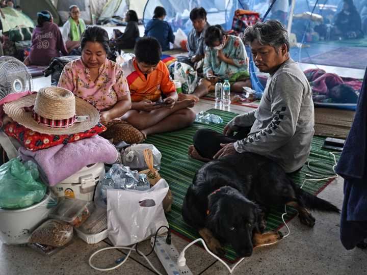 Photos: Cambodia-Thailand border clashes send half a million into shelters
