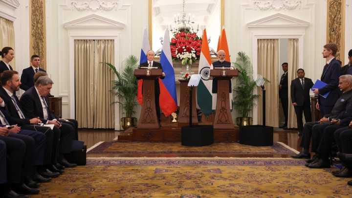 Putin and Modi discuss trade and peace at summit talks in India