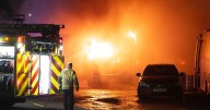 Huge blaze at bus depot treated as deliberate by cops after scene locked down