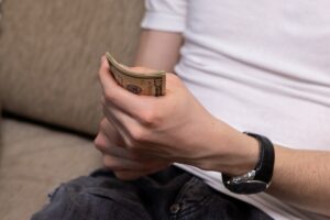 How should we handle the $500 class trip – pay it all ourselves or have our son contribute?