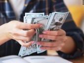 Americans spending more for the holidays despite dour economic views