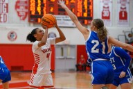 Basketball: Laila Williams helps H