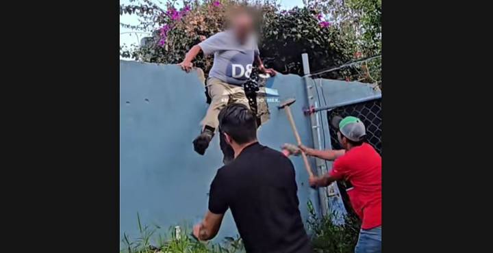 Le tiran en su cara la barda tras invadir terreno; video se hace viral