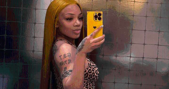 GloRilla Tiny Top Turns Risky Next to Her Sheer Skirt in Photos