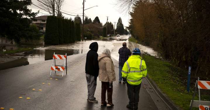 In photos: Flooding in Western Washington state forces thousands to evacuate