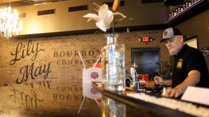 Lily May Bourbon Company celebrates grand opening with ribbon cutting