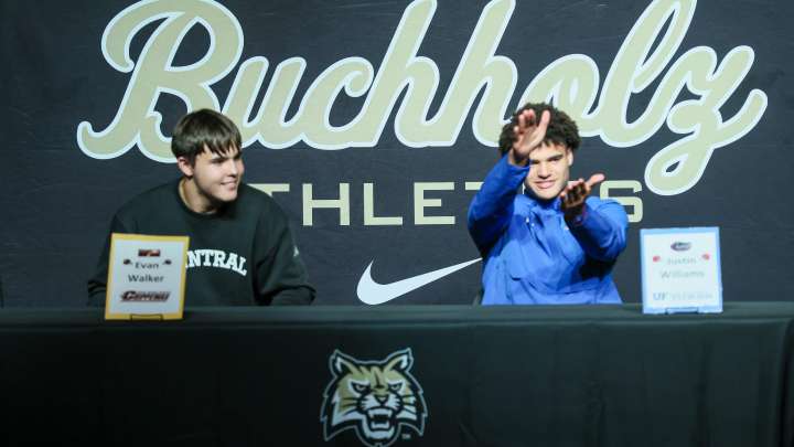 Photos: Buchholz football's Justin Williams and Evan Walker on Signing Day