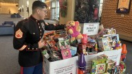 Toys for Tots gave this Marine his first Christmas gift. He worries kids this year won't be so lucky
