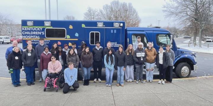 Dunbar High students stuff ambulance with toys for pediatric patients