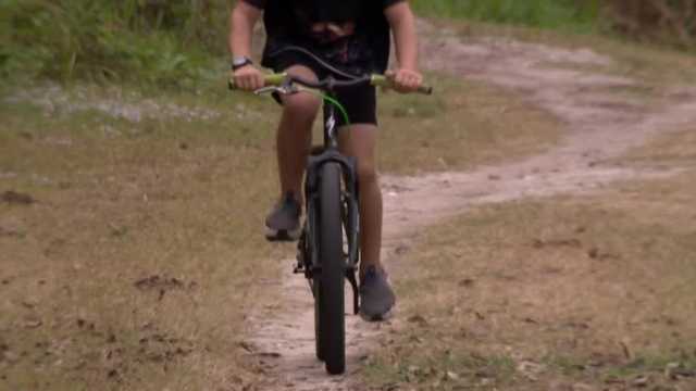 Graffiti, hate symbols discovered at Palm Bay mountain bike trail