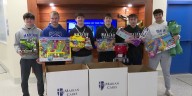 Marian High School football team participates in annual ‘Toys for Tots’ drive