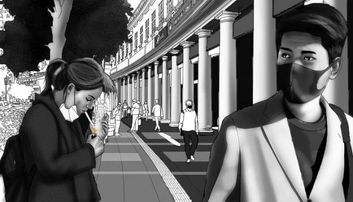 The contradiction that’s Delhi — smoking cigarettes through a mask