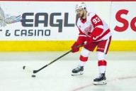 Wings build 4-goal cushion, hang on to edge Flames - The Rink Live | Coverage of youth, junior, high school and college hockey