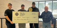 Sioux City Fire Rescue’s top mustaches make donation to Support Siouxland Soldiers