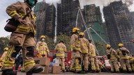 Police comb fire-ravaged Hong Kong apartments, death toll at 146