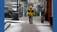 Winter's first big snowstorm hits the Northeast as schools close and traffic slows