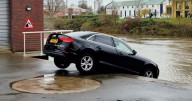 'Can't park there mate' - £40k Audi teeters on edge of river as handbrake fails