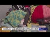 Handmade blankets donated at Tampa event, providing a little extra warmth to families in need