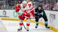 Kane breaks tie late in 3rd, Red Wings rally to top Kraken